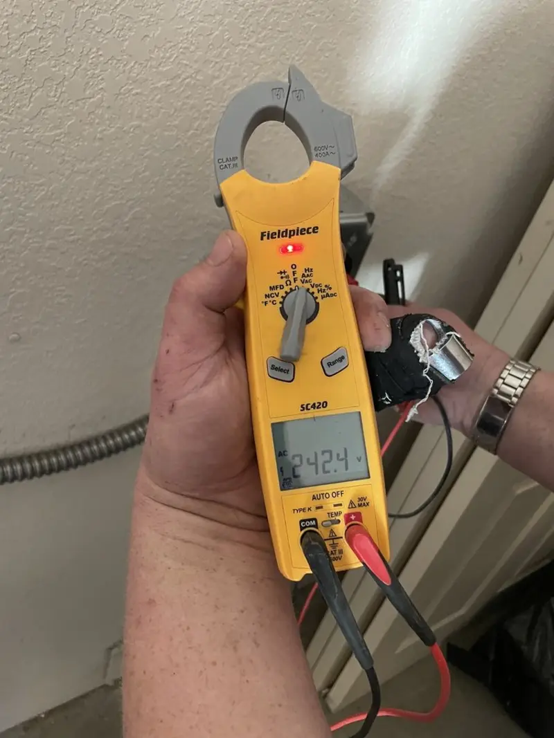 Voltage testing with clamp meter during Outlet Installation in Stroud